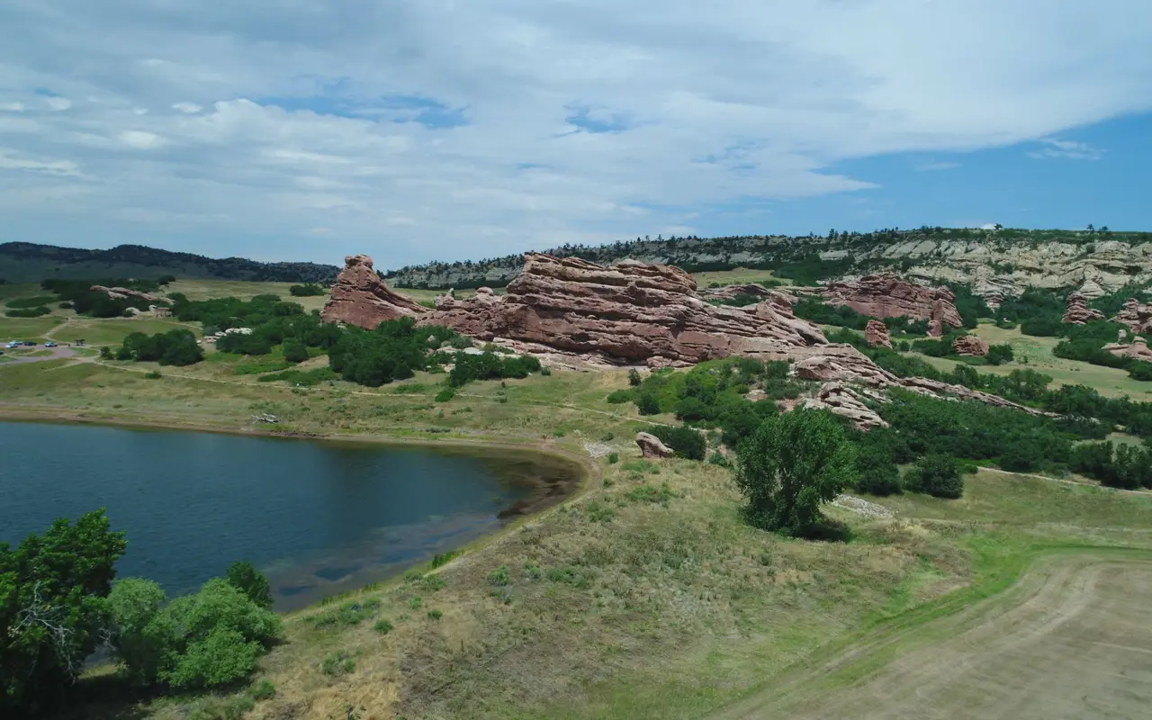 Red rock formations and a reservoir in the foothills south of Littleton